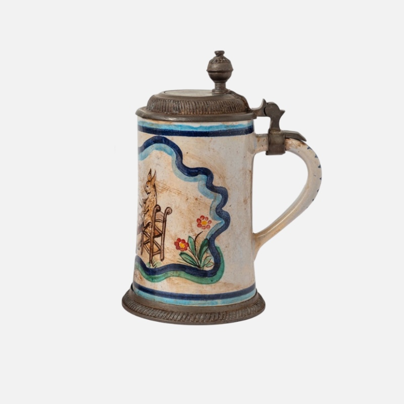 Hand-decorated old pewter mugs