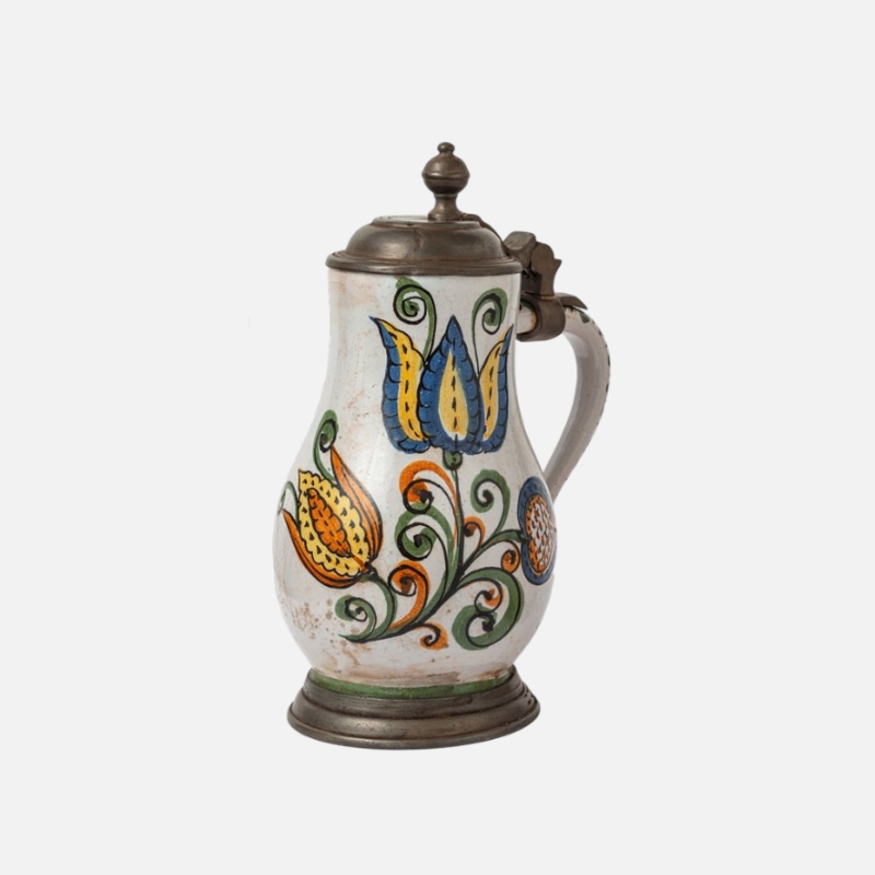Hand-decorated old pewter mugs