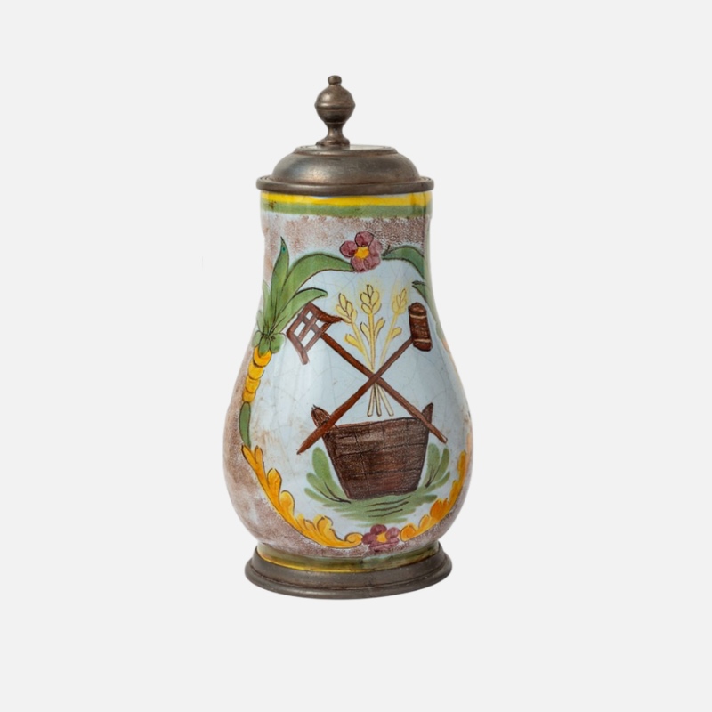 Hand-decorated old pewter mugs