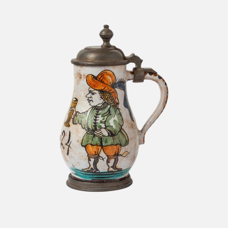 Hand-decorated old pewter mugs