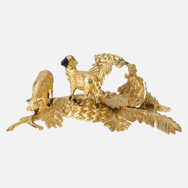 Elegant pair of high quality hand-painted gilded pewter napkin rings